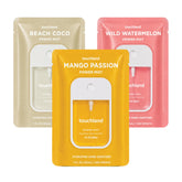 Touchland front packaging showing three travel bottles and bright branding for portability