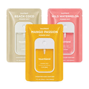 Touchland front packaging showing three travel bottles and bright branding for portability