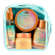 Tree Hut envase frontal del kit Tropic Glow mostrando las cuatro piezas y presentación atractiva