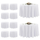 TUOTPE front view of ten white tablecloths neatly stacked for easy event setup