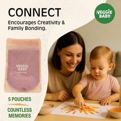 Veggie Baby baby handprint on paper showing safe sensory play and creativity