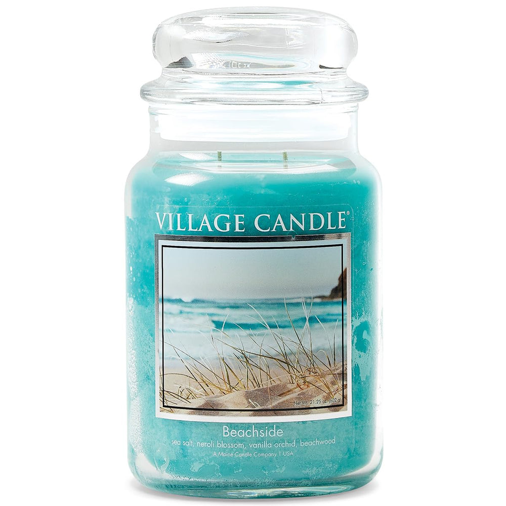 Village Candle tarro frontal azul claro mostrando diseño y aroma