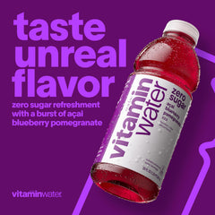 vitaminwater botella en mano que muestra tamaño práctico y portabilidad