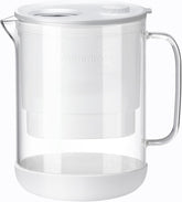 Waterdrop PT-72W front view showing sleek white glass pitcher and lid, elegant countertop benefit