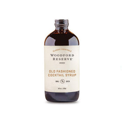 Woodford Reserve botella frontal muestra jarabe con aroma a cereza y naranja