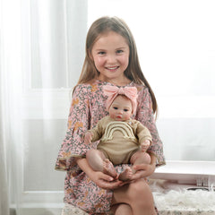 WOOROY tan knit outfit with pink bow headband highlighting removable styling options