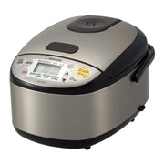 Zojirushi front view of compact rice cooker showing polished stainless finish and controls