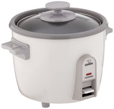 Zojirushi arrocera frontal blanca mostrando interruptor y diseño compacto, para cocinas pequeñas