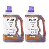 Zum botella frontal Amber mostrando etiqueta y tamaño 64 oz, limpia y concentrada