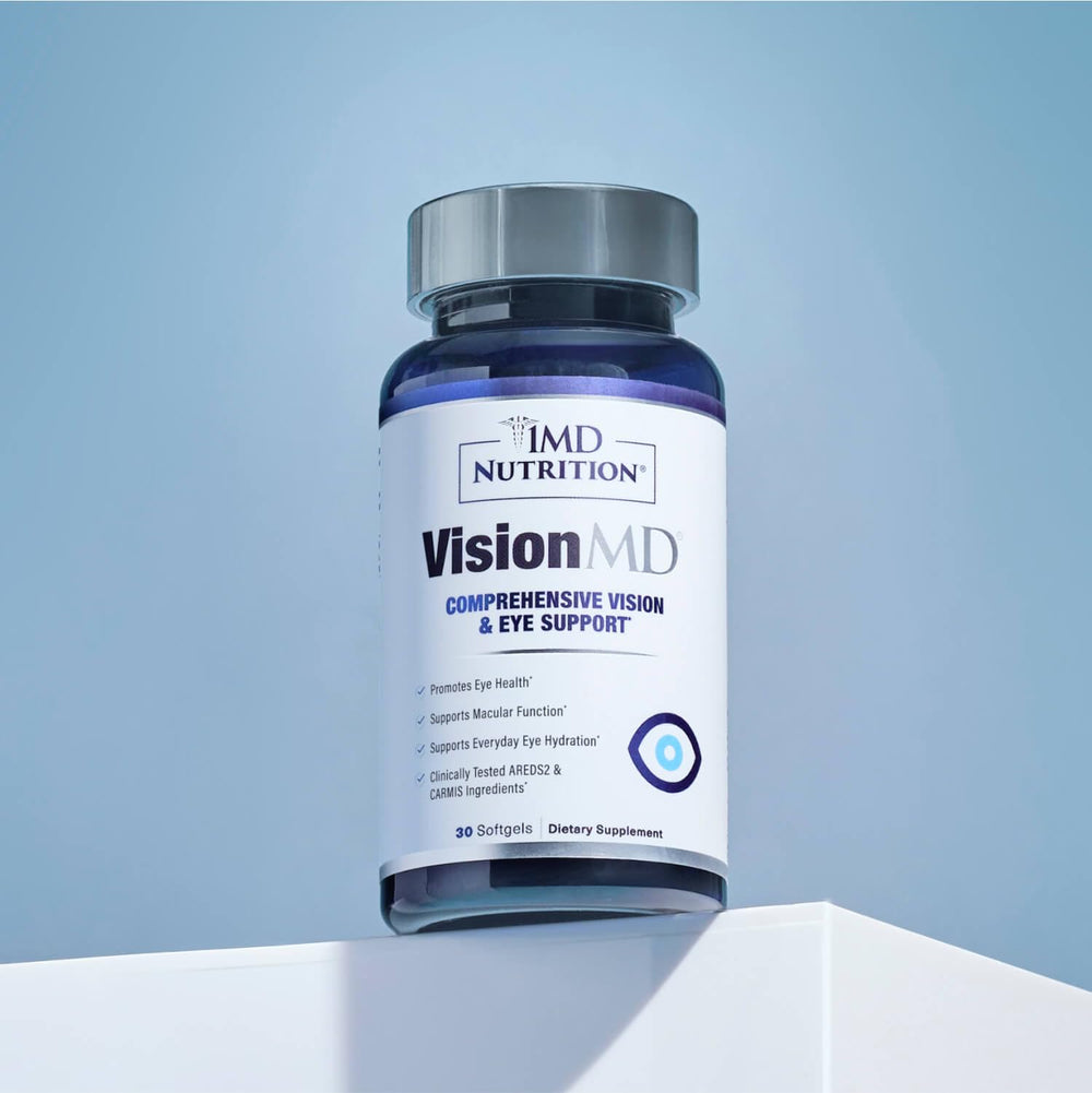 1MD VisionMD beside laptop and smartphone suggesting support for screen-related eye strain