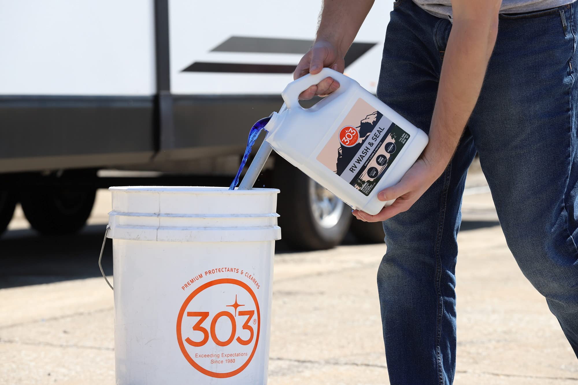 303 Products being applied with a soft wash mitt to protect paint and coatings