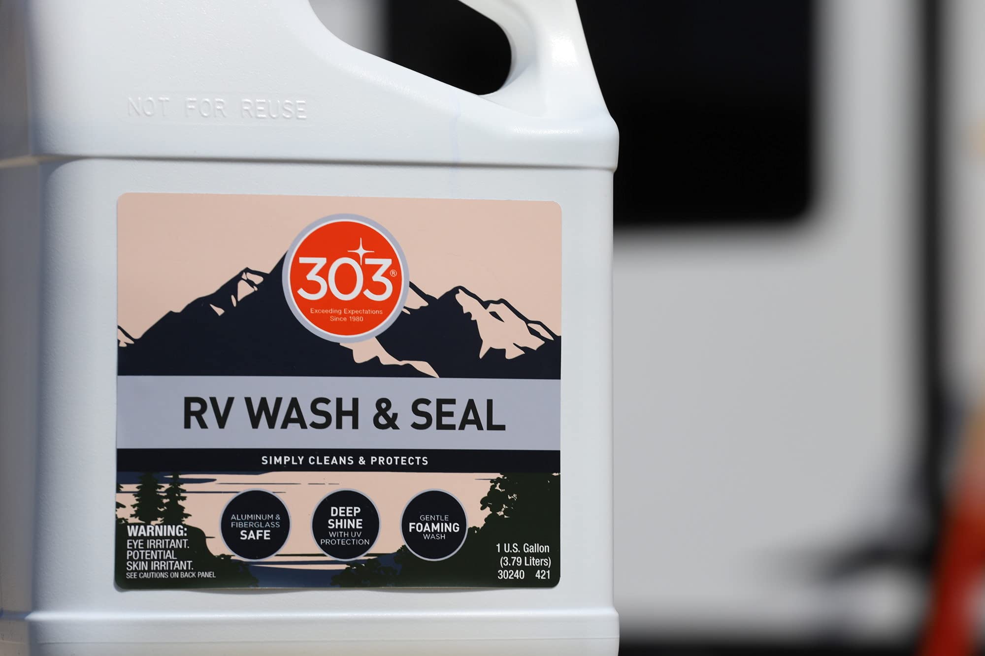 303 Products gallon next to common items for scale to emphasize value per ounce
