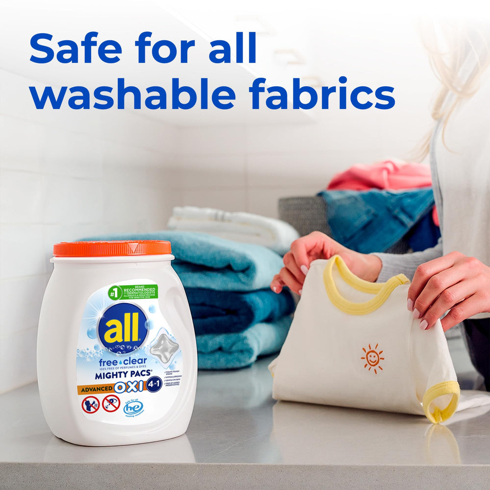 all free clear MIGHTY PACS beside baby clothes showing gentle-for-sensitive-skin benefit