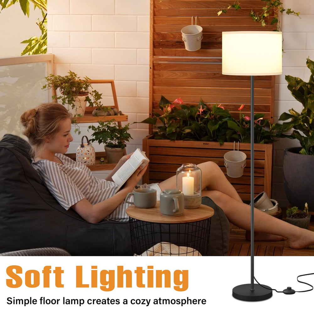 Ambimall lamp next to sofa showing compact size and space-saving benefit