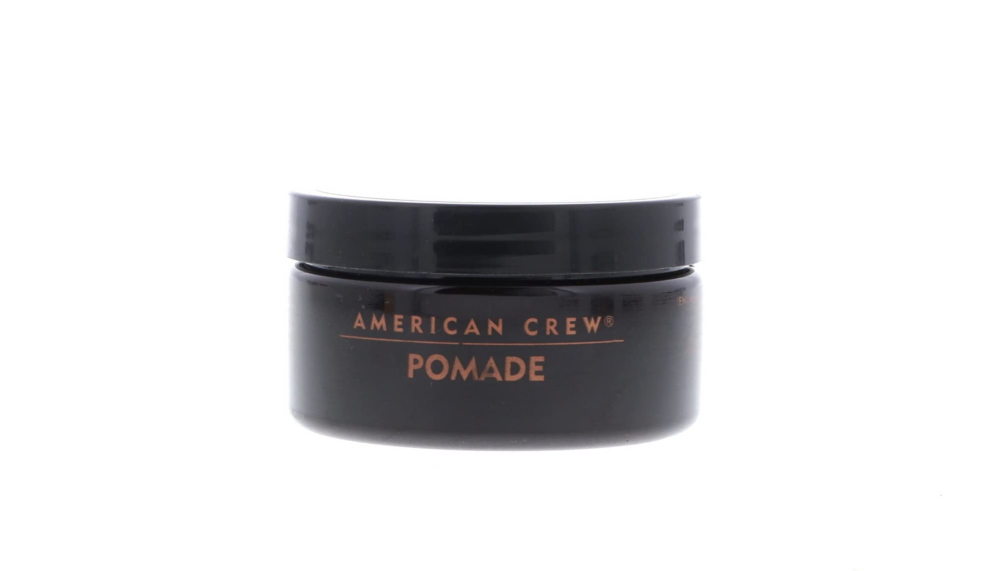 American Crew envase junto a objetos para comparar tamaño y portátil
