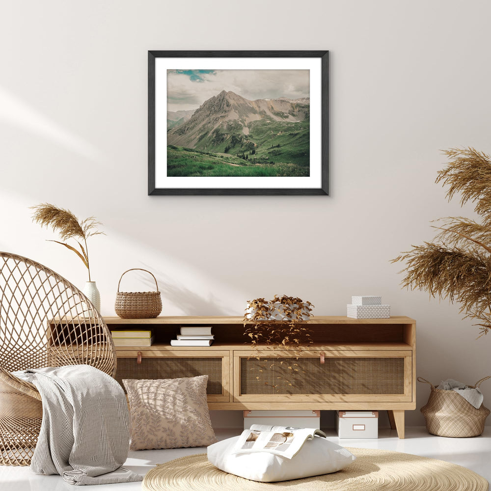 Americanflat framed poster next to chair for scale and room placement guidance