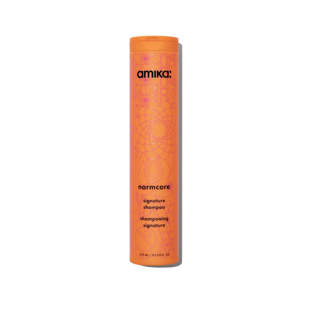 Amika frasco frontal 275ml mostrando diseño y cantidad