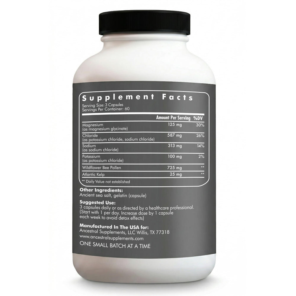 Ancestral Supplements cápsulas dispersas sobre mesa, fácil dosificación y toma