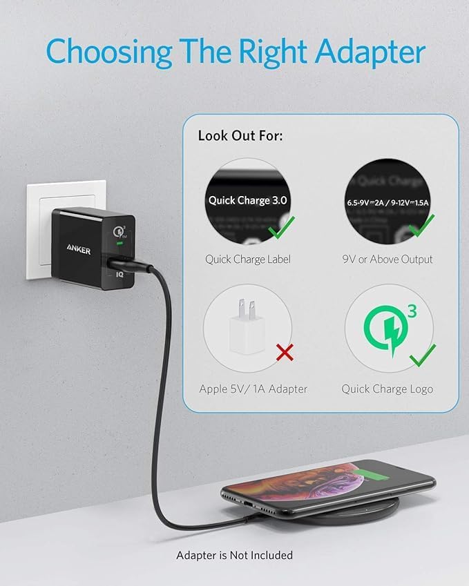 Anker 313 en uso con smartphone colocado centrado, carga estable