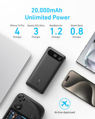 Anker power bank in hand for scale showing compact travel benefit