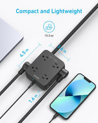 Anker regleta en escritorio con laptop y lámpara, alimentación ordenada