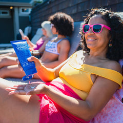 AQUA GUARD being applied to damp hair to protect against chlorine damage