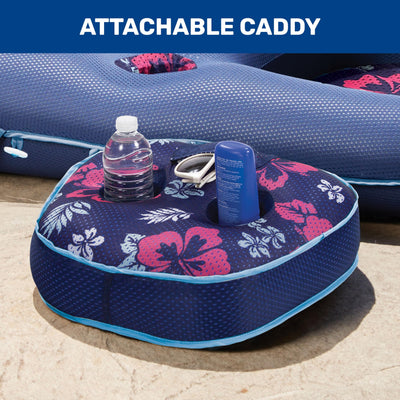 Aqua LEISURE float with person for scale illustrating 56 by 36 inch size and capacity