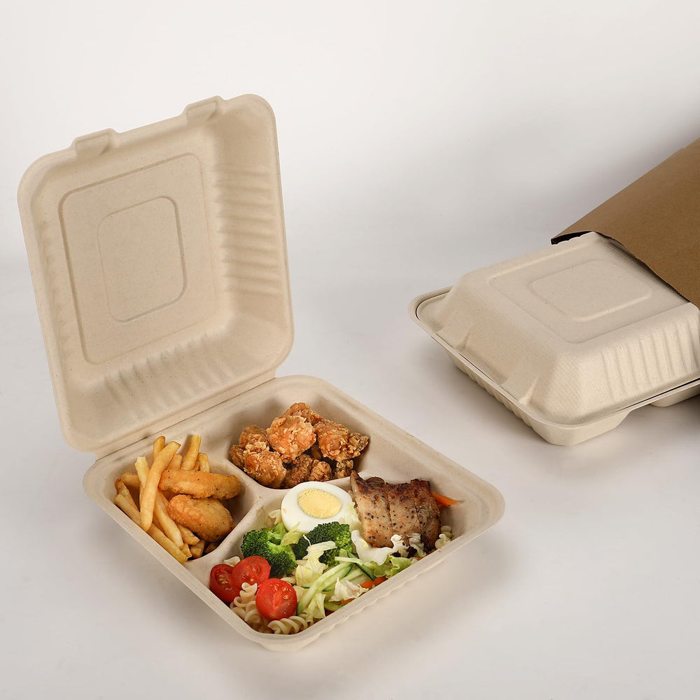 Aricsen stacked containers beside a hand for scale showing compact storage