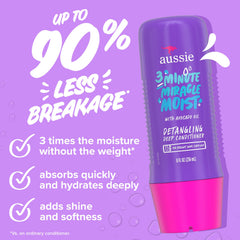 Aussie conditioner texture on fingertips demonstrating smoothing and detangling action