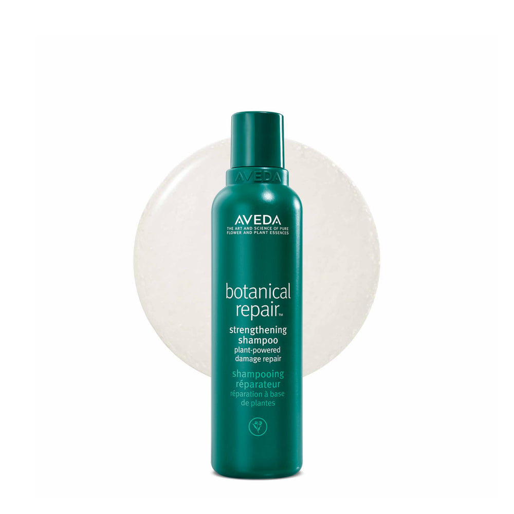 Aveda frontal del empaque mostrando champú fortalecedor y beneficios