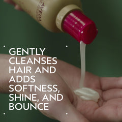 Aveda bottle dispensing shampoo, demonstrating gentle lather and ease of use