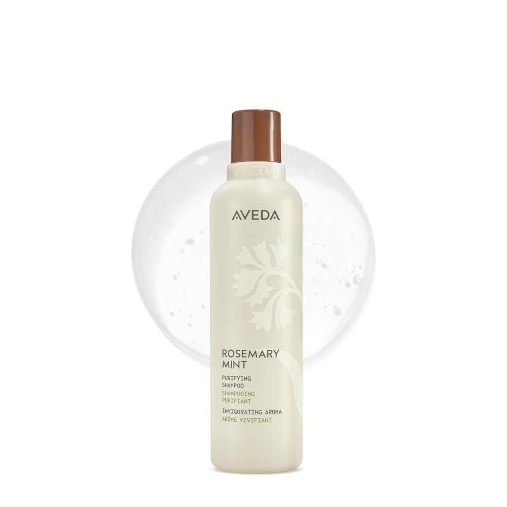 Aveda botella frontal del champú con etiqueta visible y aspecto profesional, limpieza eficaz