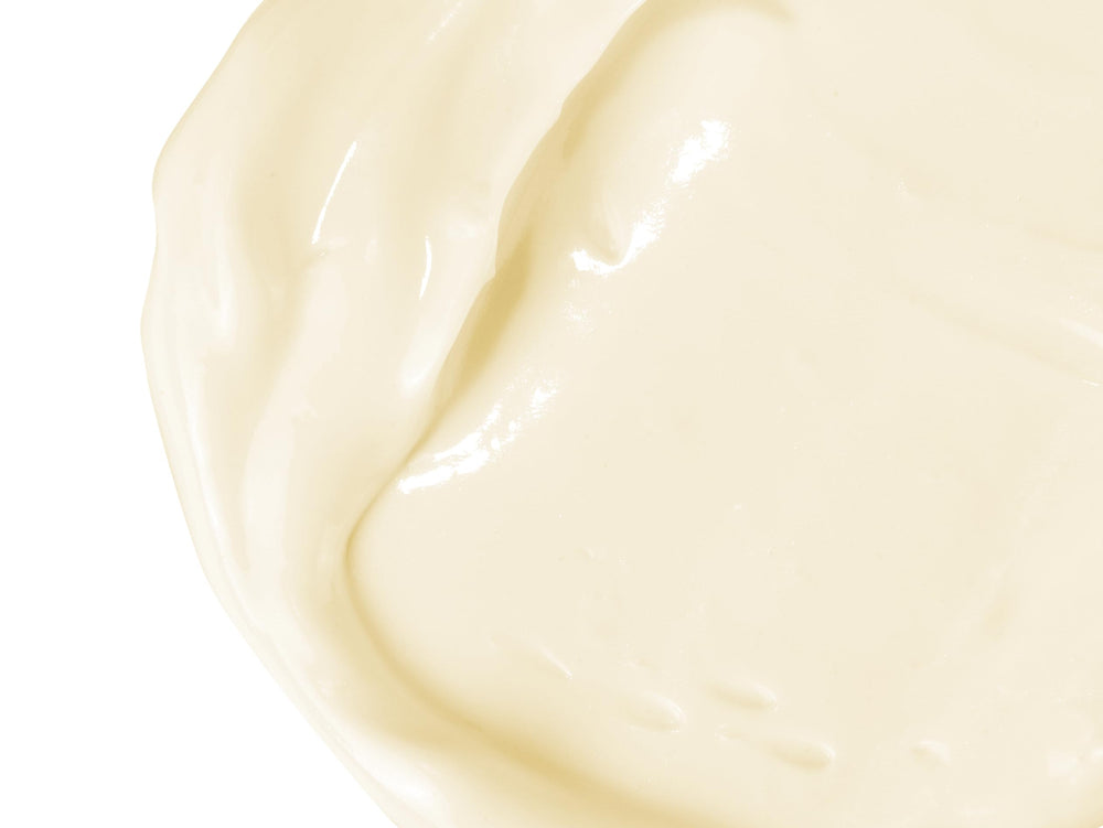 Babo Botanicals bomba en mano aplicando loción práctico y fácil