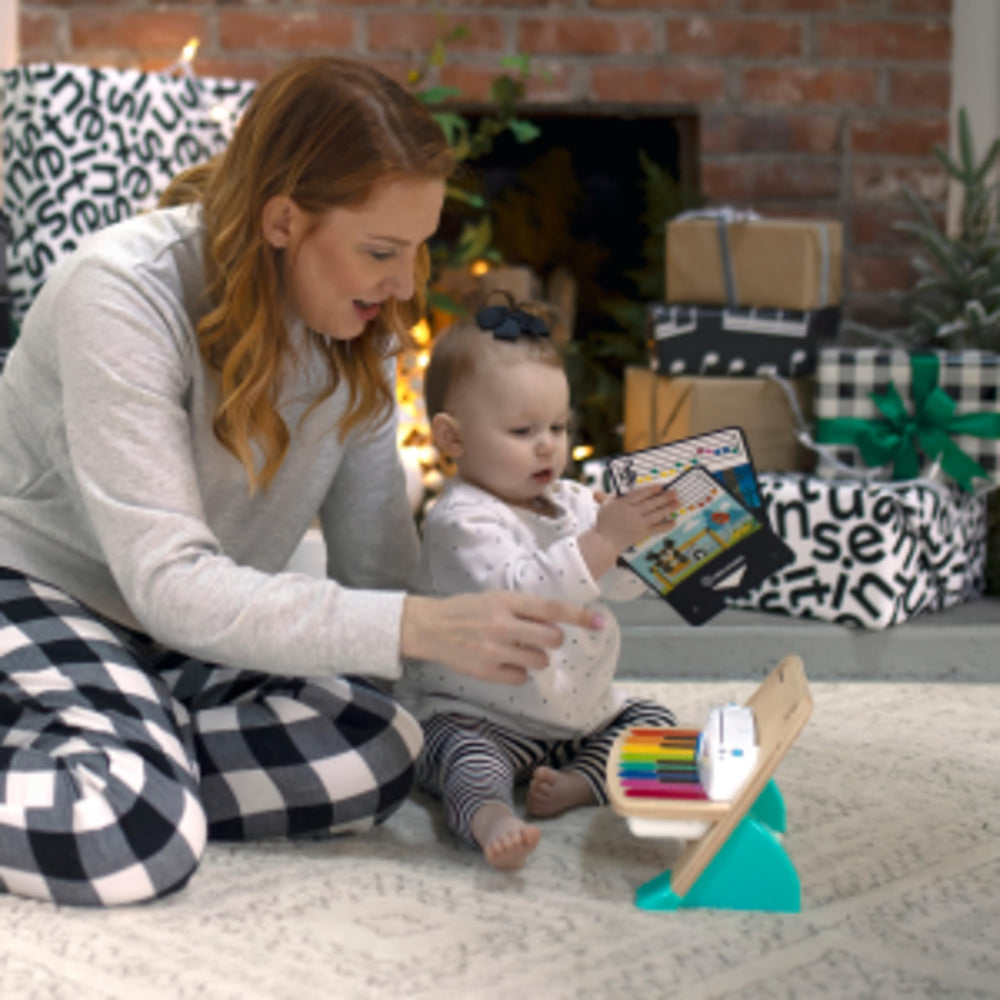 Baby Einstein piano toddler playing at home demonstrating creative musical development