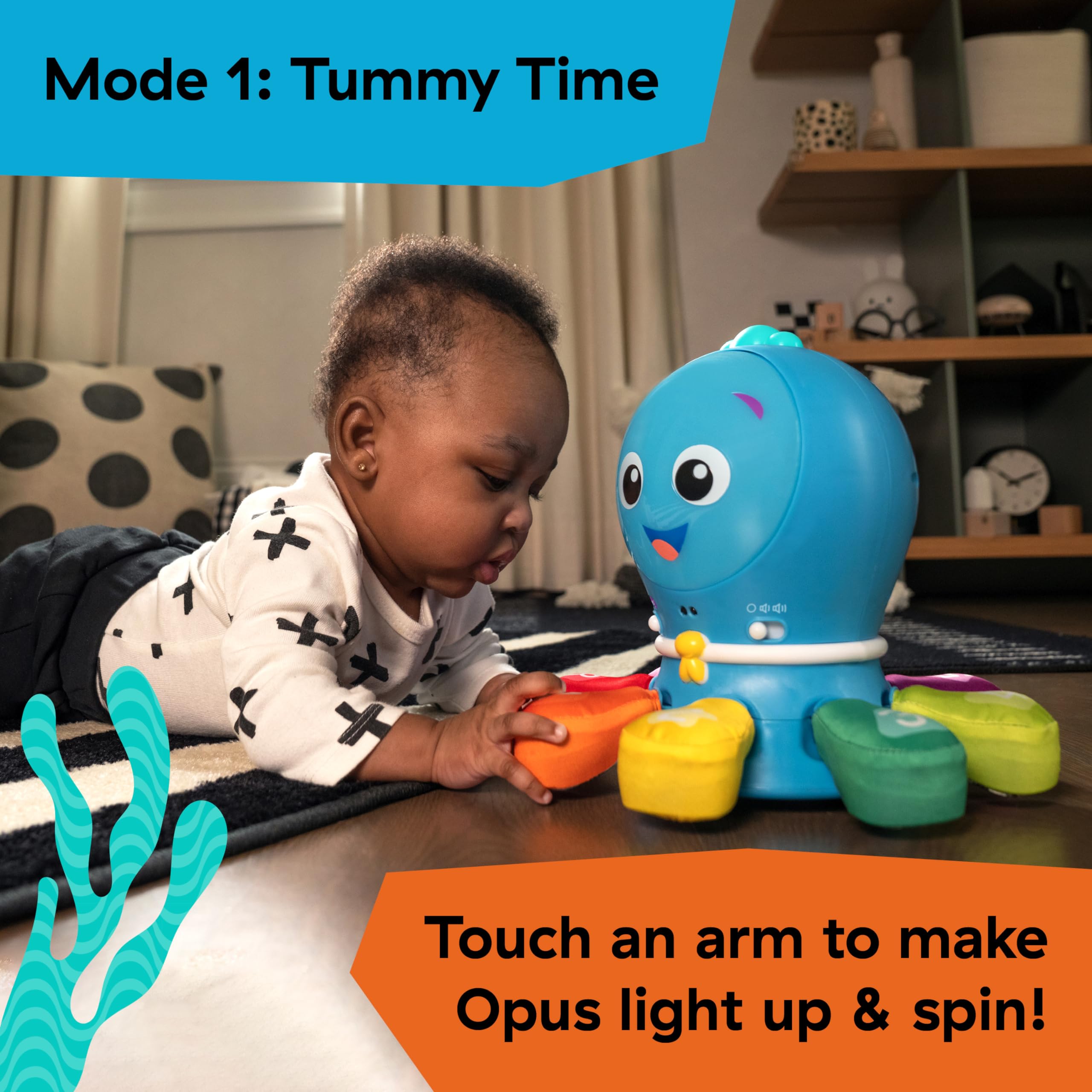 Bebé en Tummy Time tocando Opus Go de Baby Einstein, fortalece cuello y hombros