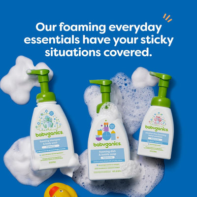 BabyGanics bottle beside diaper bag suggesting travel-ready, on-the-go convenience