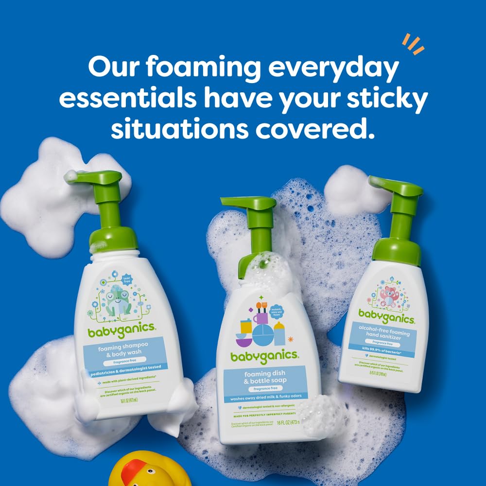BabyGanics bottle beside diaper bag suggesting travel-ready, on-the-go convenience