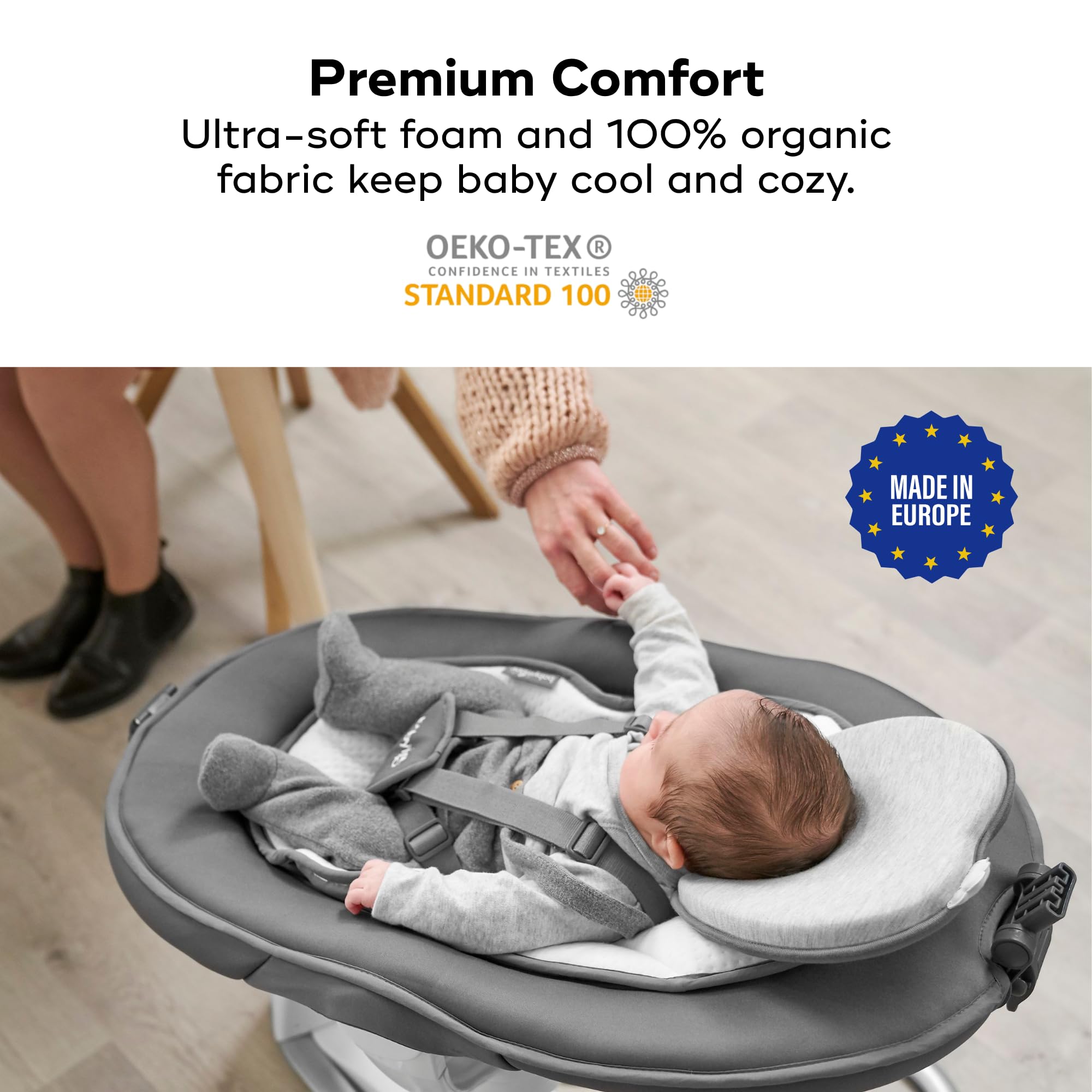 Babymoov Lovenest next to a water bottle showing compact size and portability