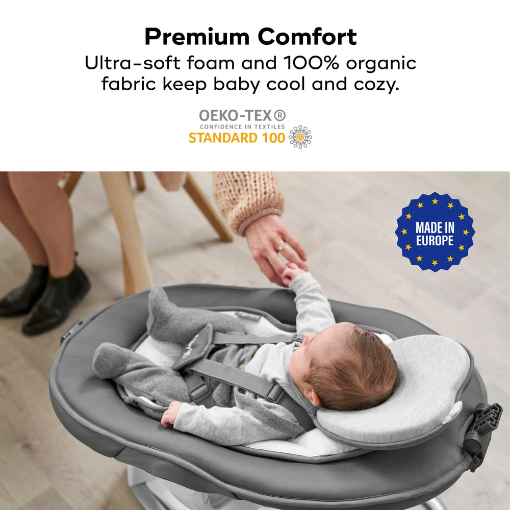 Babymoov Lovenest next to a water bottle showing compact size and portability