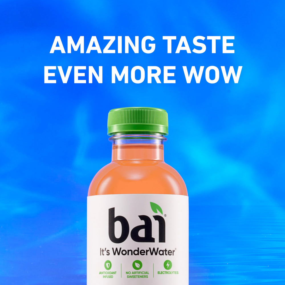 Bai bottle held in hand showing 18 oz size and portability benefit