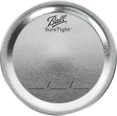 Ball lids alongside empty mason jars illustrating ready-to-use convenience