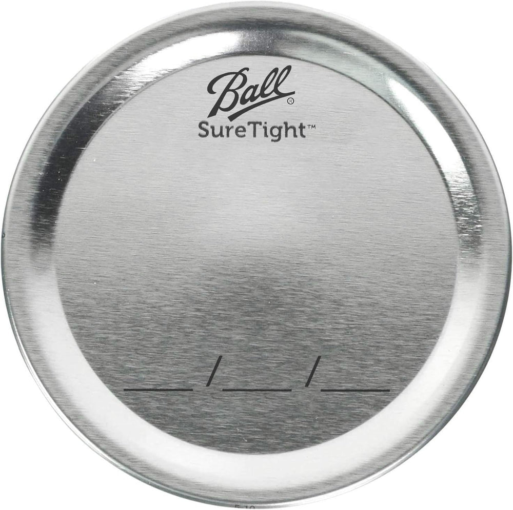 Ball lids and matching bands top view, organized for quick canning