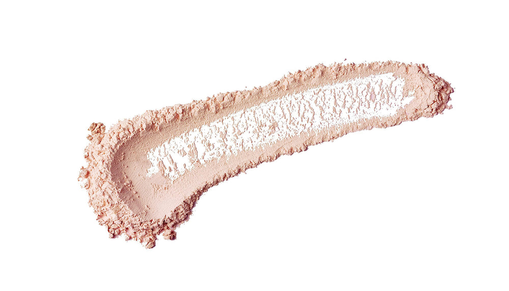 bareMinerals detalle de la textura del polvo suelto que ofrece acabado difuminado