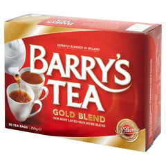 Barry's Tea bolsita junto a una moneda para comparar tamaño