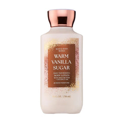 Bath & Body Works loción Warm Vanilla Sugar frente mostrando envase y beneficios