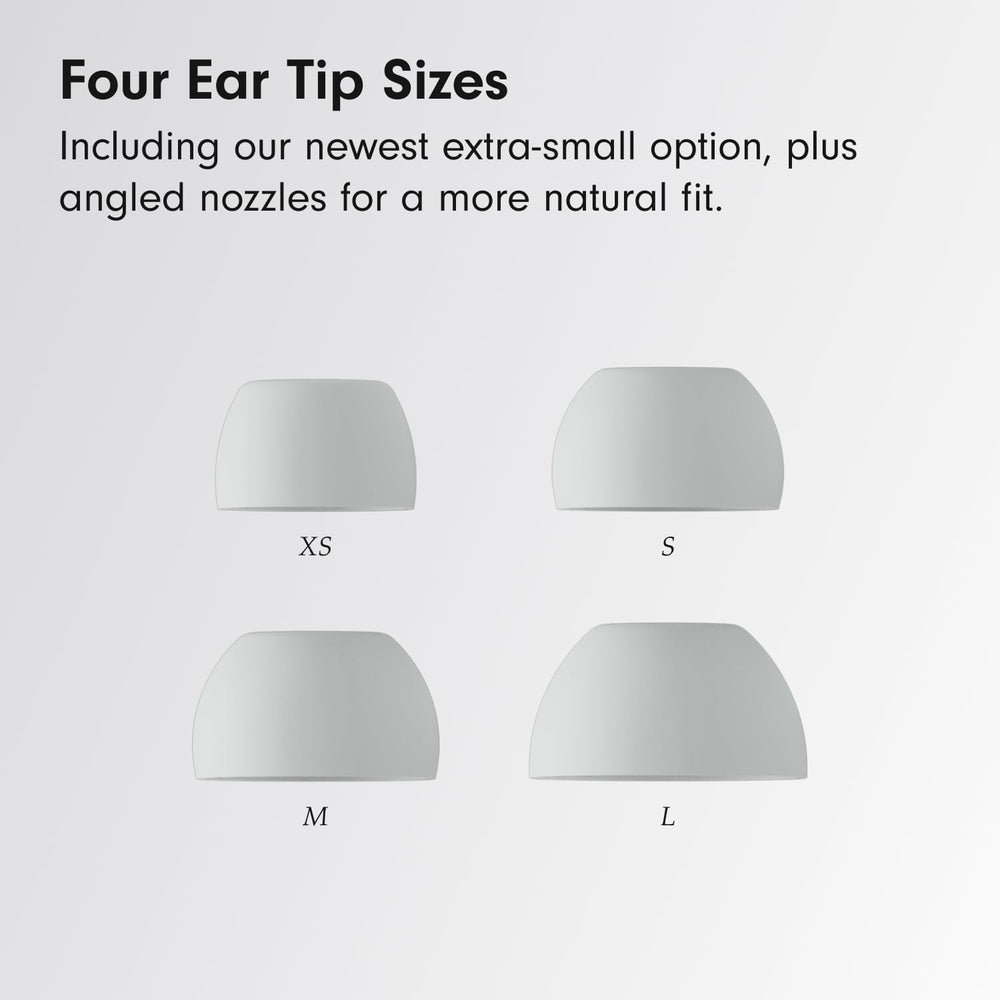 Beats Solo Buds beside a smartphone and keys illustrating pocket-sized scale