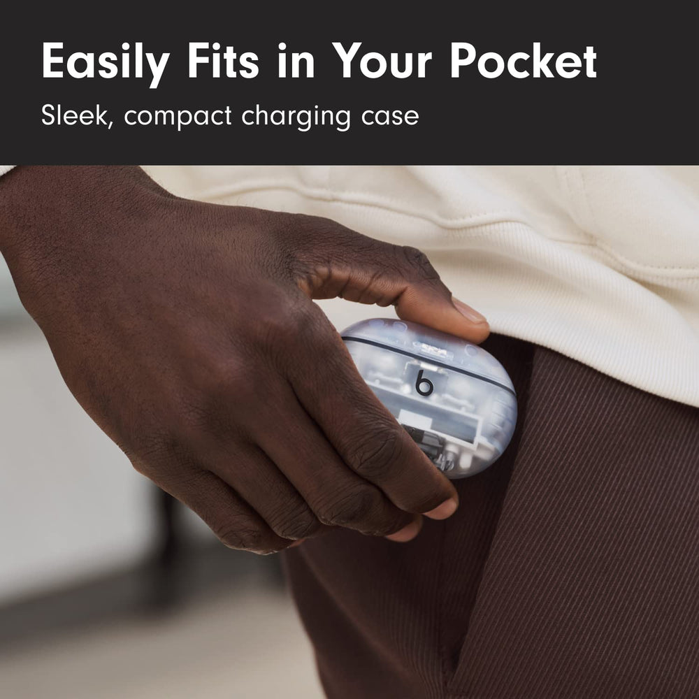Beats Studio Buds + charging case next to keys to show compact everyday carry benefit