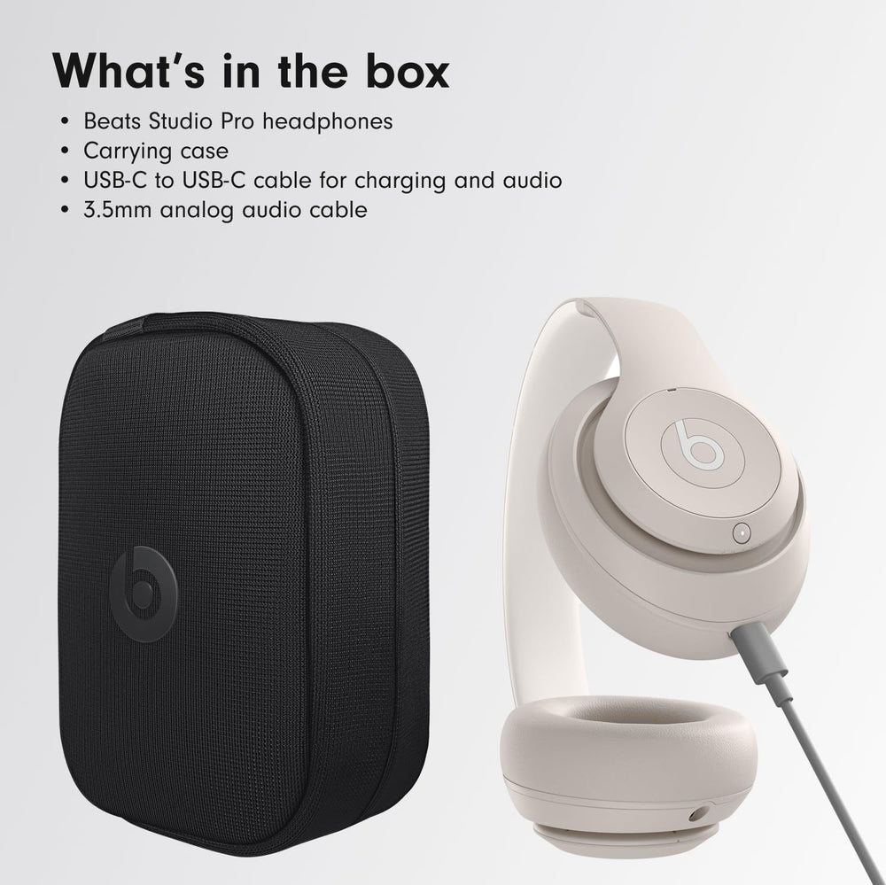 Beats Studio Pro beside a paperback to show scale and compact foldable design for travel