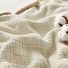 Bedsure vista frontal de la manta muselina beige lino con aspecto suave