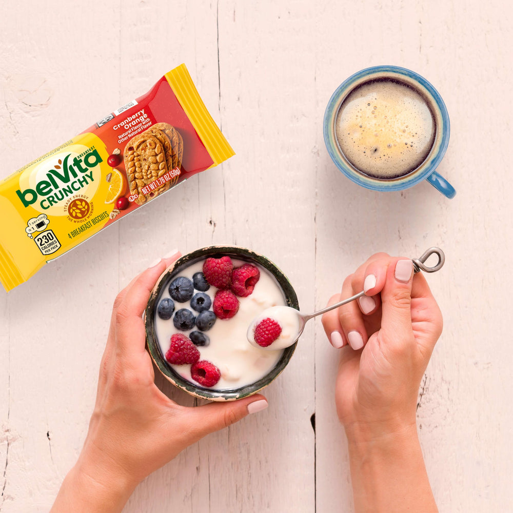 belVita biscuit held in hand to show scale and easy on-the-go eating